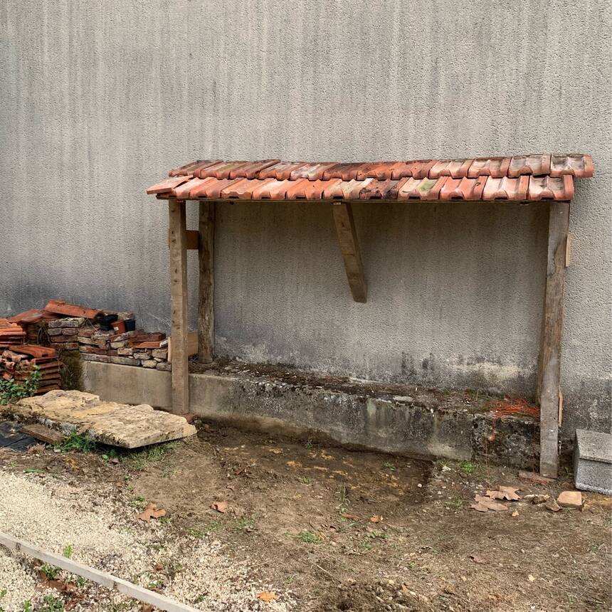 Wood storage shed complete. In the process, we found that the area that we call 