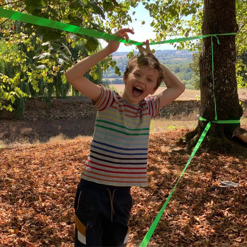 Slack line fun in the garden.