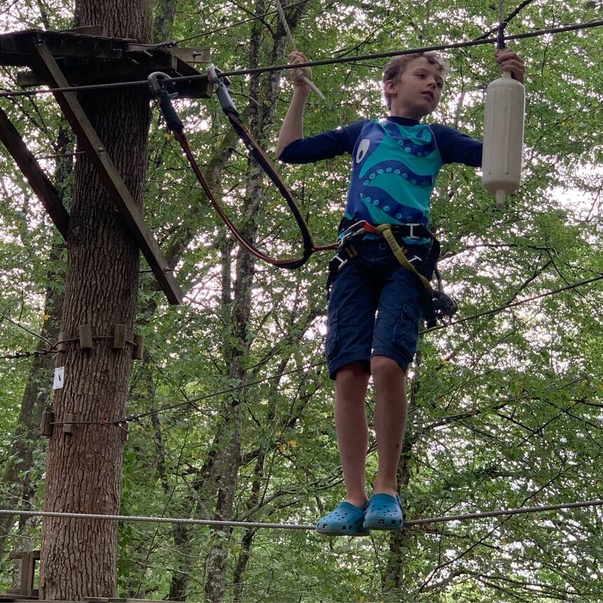 Zip lines in the tree tops.  We return to the Aignan lake zip lines every opport