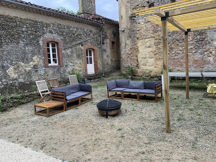 Today we added a fire pit and outdoor lounge furniture. The pieces still need to