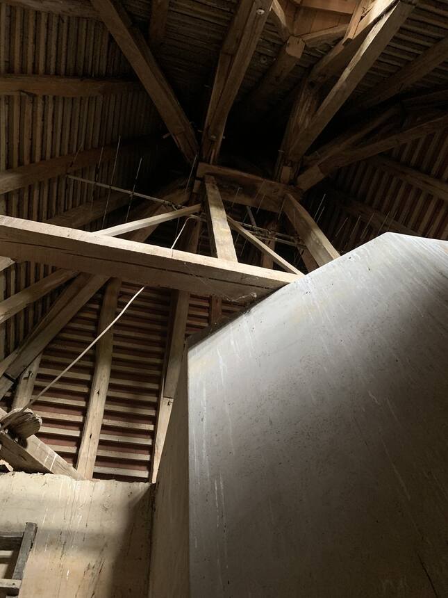 Looking for leaks in the tower roof.