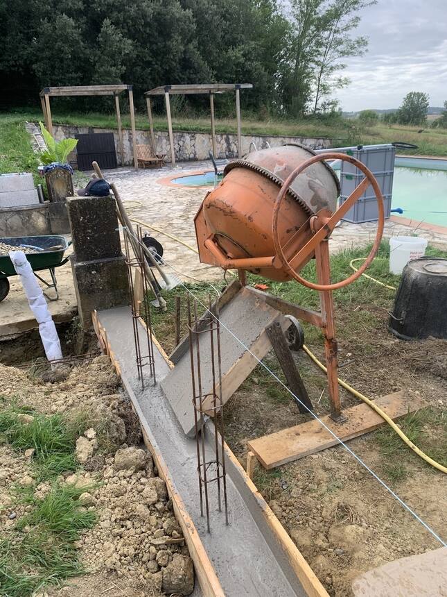 Footing poured. 80 sacks of ready mix and one very long day. Sincere thanks to o