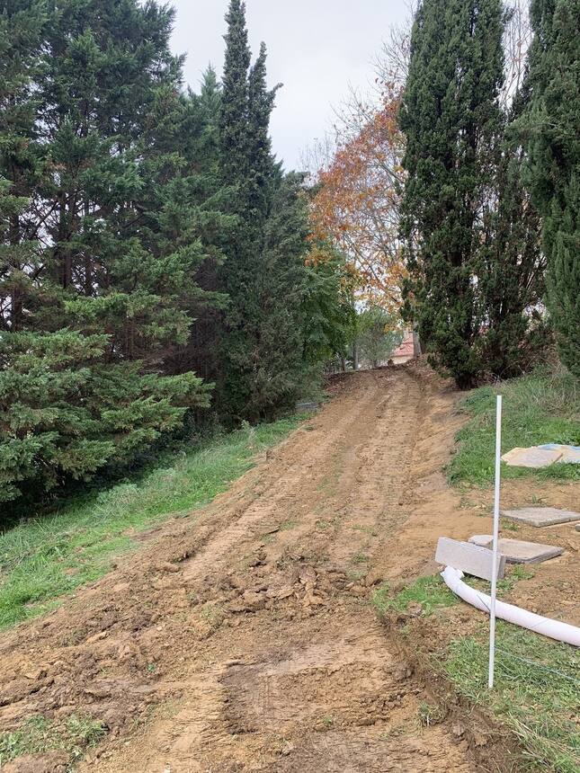 Lots of progress today! We carved a new road to the pool area from the west entr