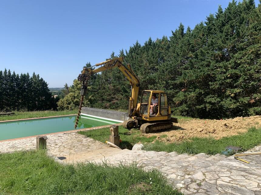 Next we dig the piers for the terrace.