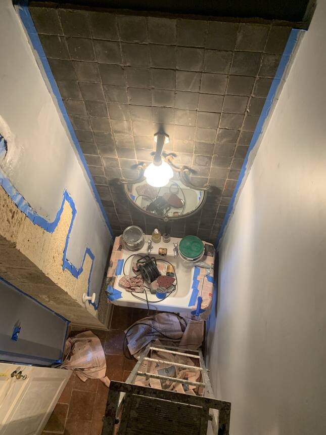 Prepping and priming the little downstairs toilet for a new coat of paint. It’s 